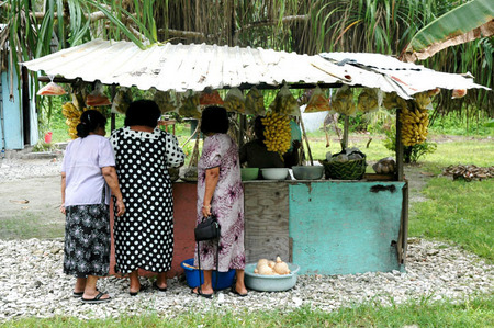 Annie, Polly and Herminia buying fruit on a Sunday jambo to Laura, Majuro, RMI, © Sue Rosoff, all rights reserved