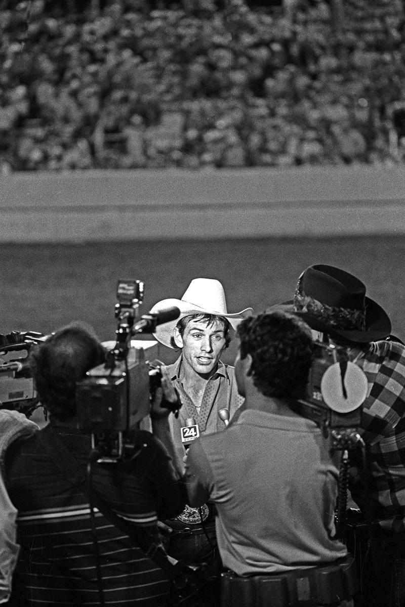Lane Talking to the press after the first time he rode Red Rock in Redding. 1988, © Sue Rosoff, all rights reserved