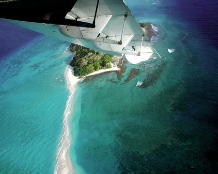 Air Marshall Islands flying towards Likiep, RMI, © Sue Rosoff, all rights reserved